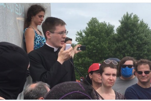 Catholic priest among defenders of St Louis statue; Muslim Action Network “take this thing down”