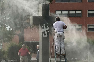 Cross and graves vandalized at Catholic university cemetery